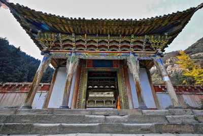 Low angle view of temple building against sky