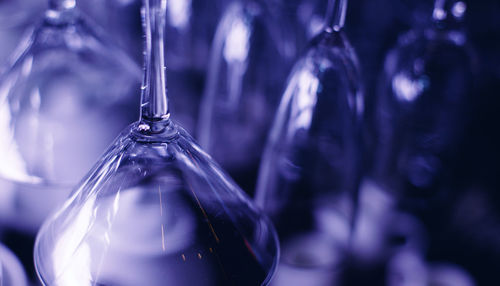 Close-up of glass hanging against blurred background