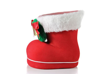 Close-up of red toy against white background