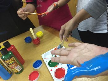 Midsection of man preparing food on table