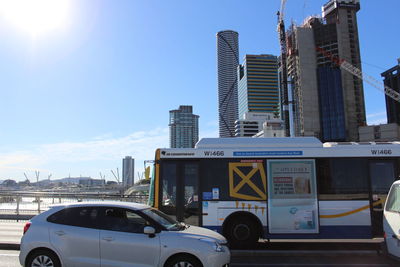 Cars on city against sky