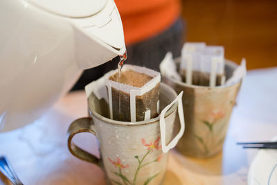 Close-up of coffee cup on table