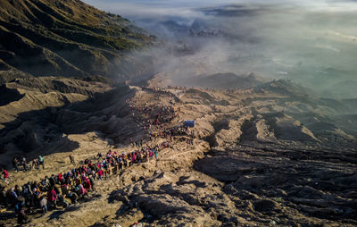 The beautiful atmosphere of tourists from mount bromo, east java, indonesia when covered in morning