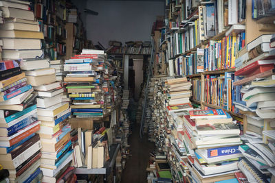 Stack of books and novels at library