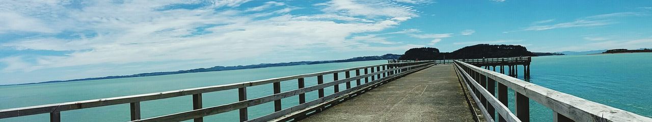 View of pier over calm sea