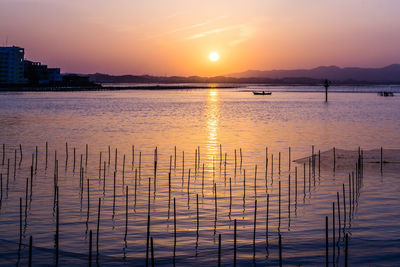 Scenic view of sea against sky during sunset