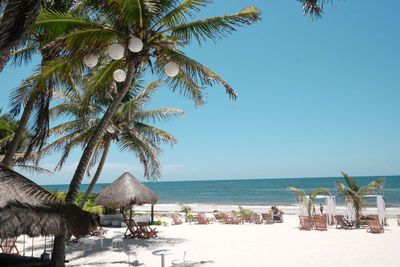 Scenic view of beach against clear sky