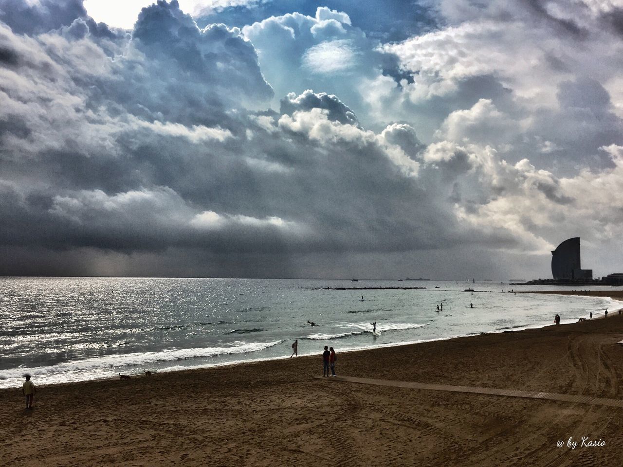 sea, beach, water, cloud - sky, horizon over water, sand, sky, nature, scenics, beauty in nature, vacations, outdoors, coastline, travel destinations, leisure activity, people, wave, adult, day, adults only