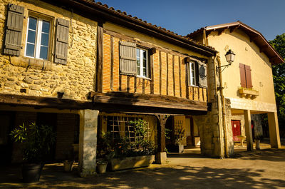 Houses by street in city