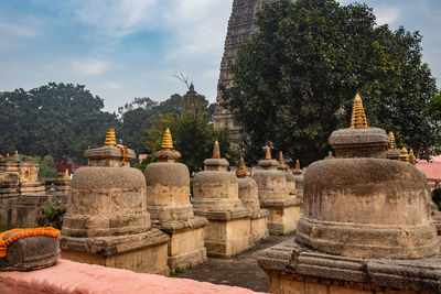 Buddhist stupas isolated with bright sky and unique prospective