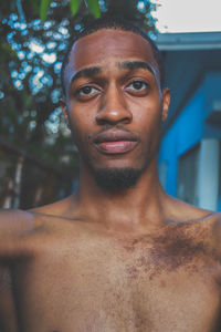 Portrait of shirtless young man