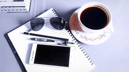 High angle view of coffee cup on table