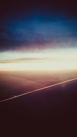 Scenic view of landscape against sky during sunset