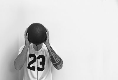 Boy against white background