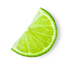 Close-up of green lemon against white background