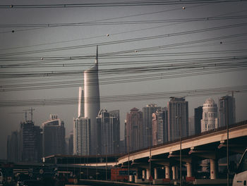 Modern buildings against sky in city