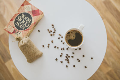 High angle view of coffee cup on table