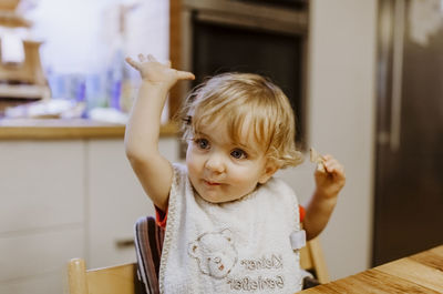 Portrait of cute girl at home