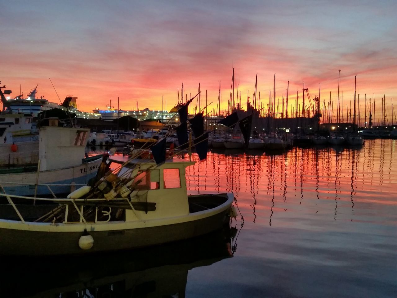 sunset, nautical vessel, transportation, moored, boat, mode of transport, water, orange color, sea, sky, harbor, mast, waterfront, reflection, sailboat, marina, silhouette, cloud - sky, scenics, nature