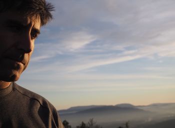 Portrait of man against sky during sunset