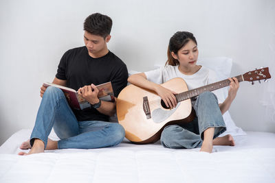 Young man playing guitar