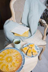 Reading and hot tea and orange pie, cozy vibes, warm home atmosphere,