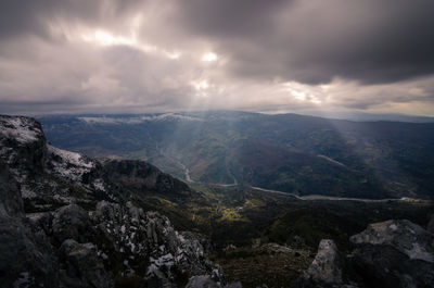 Scenic view of rocky mountains against sky