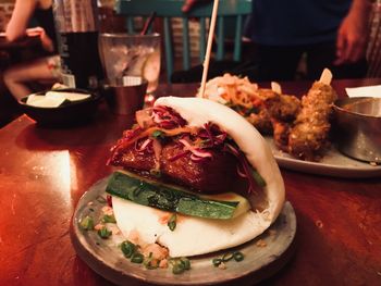 Close-up of food served on table