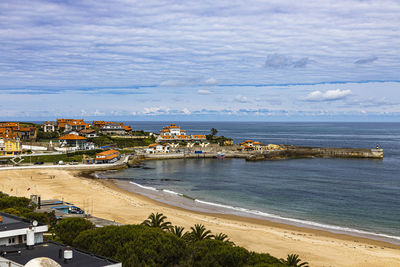 High angle view of beach against cloudy sky