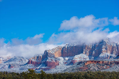 View of majestic mountain against cloudy sky