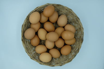 High angle view of eggs in basket