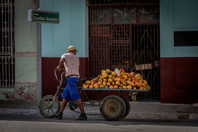 Woman standing at market stall