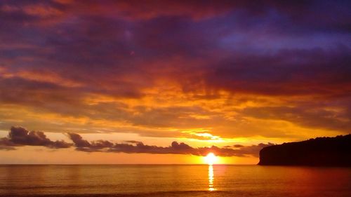 Scenic view of sunset over sea