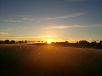 Scenic view of landscape at sunset