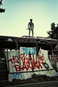 Low angle view of built structure against clear blue sky
