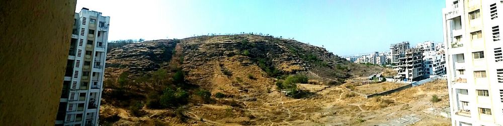 Panoramic view of city against clear sky