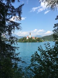 Scenic view of lake against cloudy sky