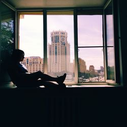 View of cityscape through window