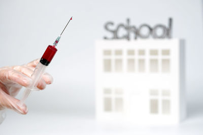 Close-up of hand holding eyeglasses