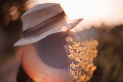 Close-up of woman holding flower bouquet