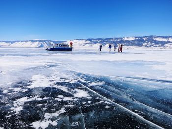 Scenic view of frozen lake against sky