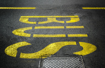 Yellow arrow symbol on road