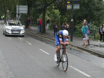 Man riding bicycle on road