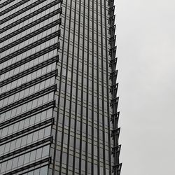 Low angle view of modern building against sky