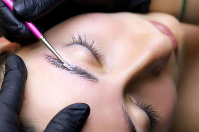 Close-up of woman getting beauty treatment