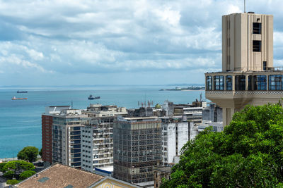 View of the bay of todos os santos and the lacerda elevator in the city of salvador, bahia.