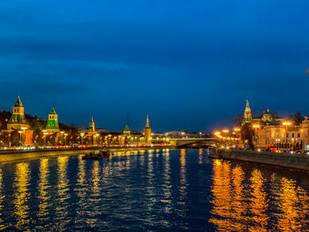 Illuminated buildings at waterfront