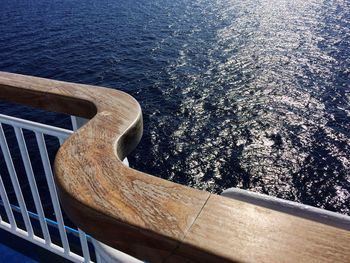 Close-up of railing against sea