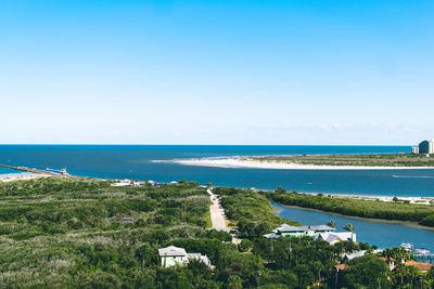 Scenic view of sea against blue sky