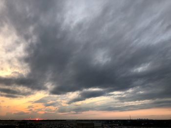 Scenic view of dramatic sky during sunset